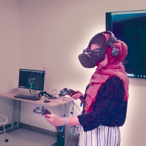 Woman wearing VR goggles